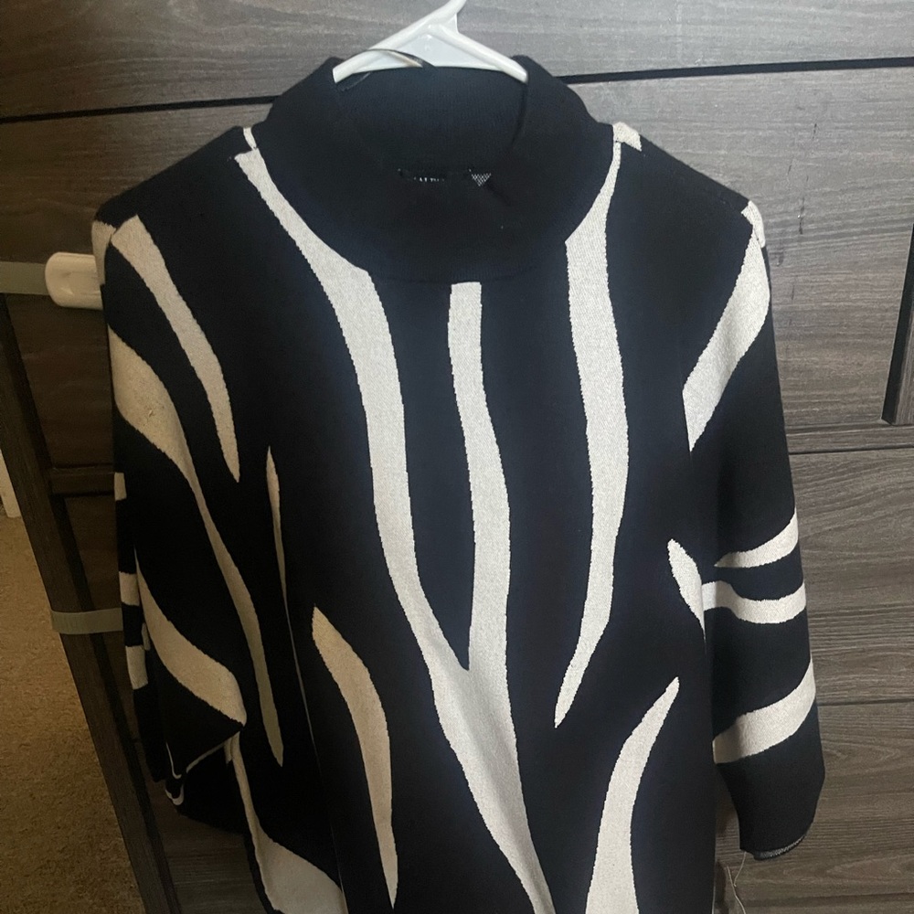 New plus size sweater size is 2XL